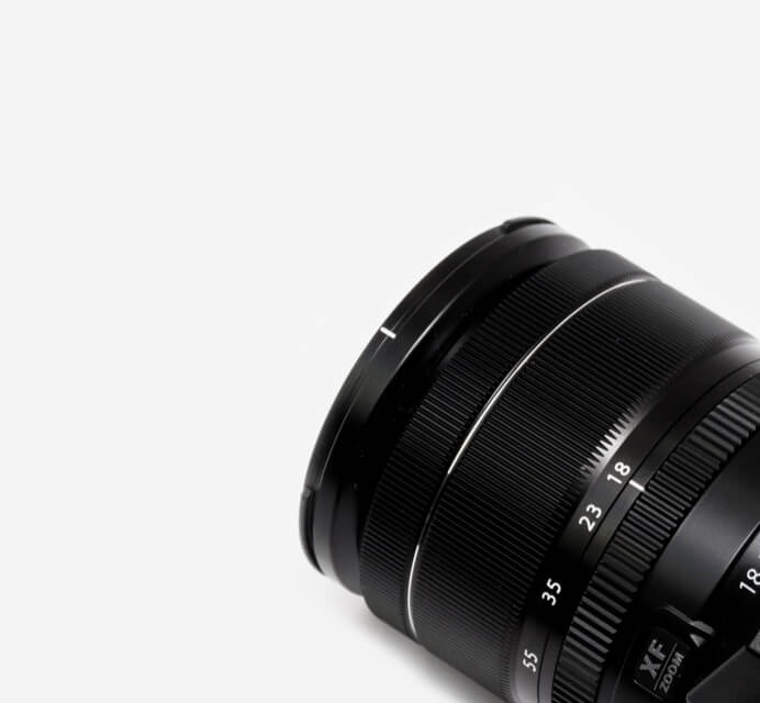 detailed view of camera lens on white background